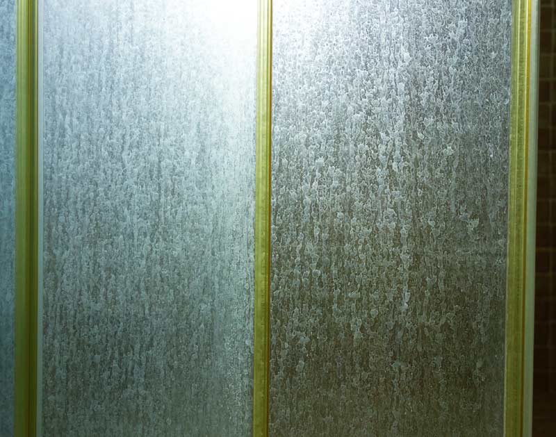 Myproperdeets - How to Clean Glass Shower Doors What's the most common  cleaning challenge with glass shower doors? Minerals in hard water, which  build up over time to create a milky-white film