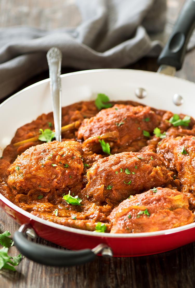 One Pan Chicken in Spicy Tomato Sauce (Ayam Masak Merah) - A classic Malay dish, chicken is seared & braised in a thick spicy, sweet sourish sauce made of a flavorful spice paste & tomato sauce. All in one pan!