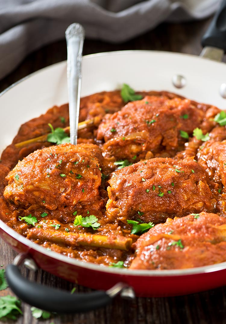 One Pan Chicken in Spicy Tomato Sauce (Ayam Masak Merah) - A classic Malay dish, chicken is seared & braised in a thick spicy, sweet sourish sauce made of a flavorful spice paste & tomato sauce. All in one pan!