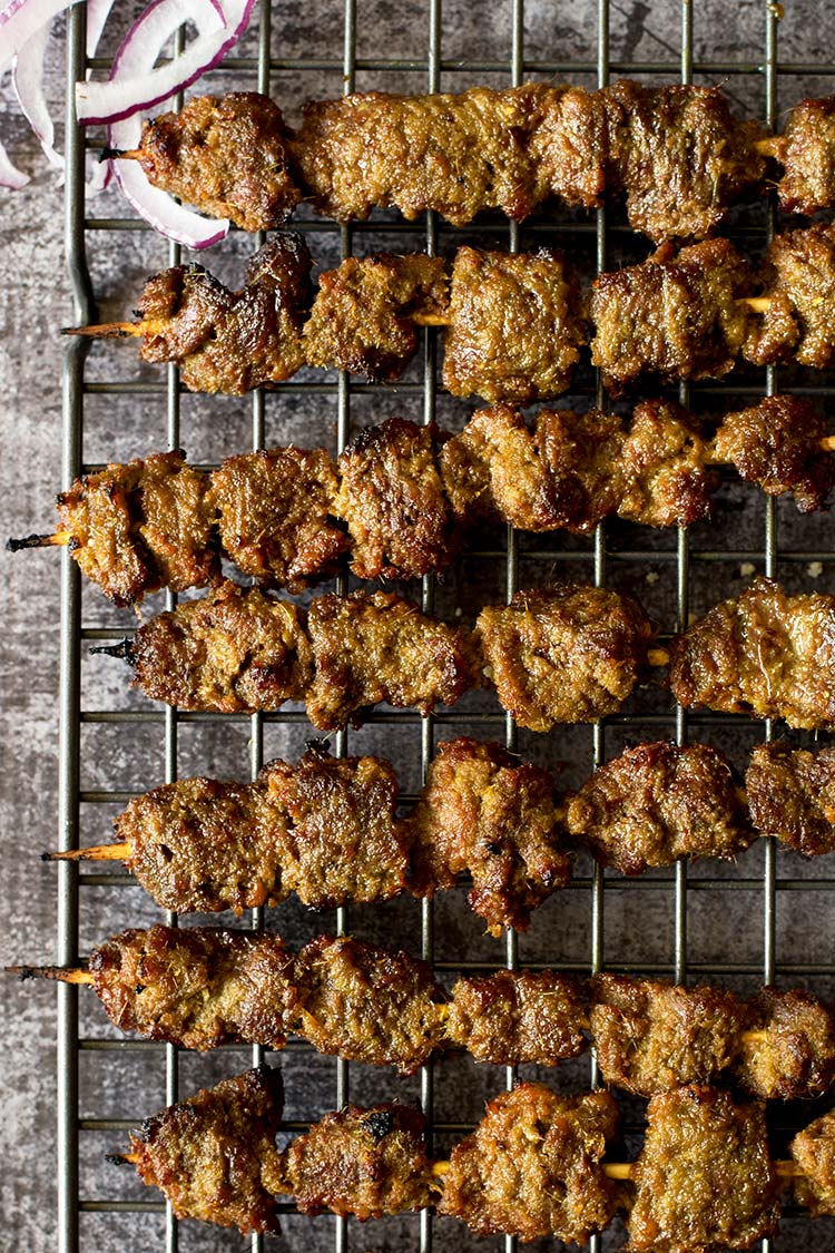 Flavorful, tender smoky beef satay marinated with plenty of herbs and spices dipped in a delectable savory, spicy, sweet peanut sauce.