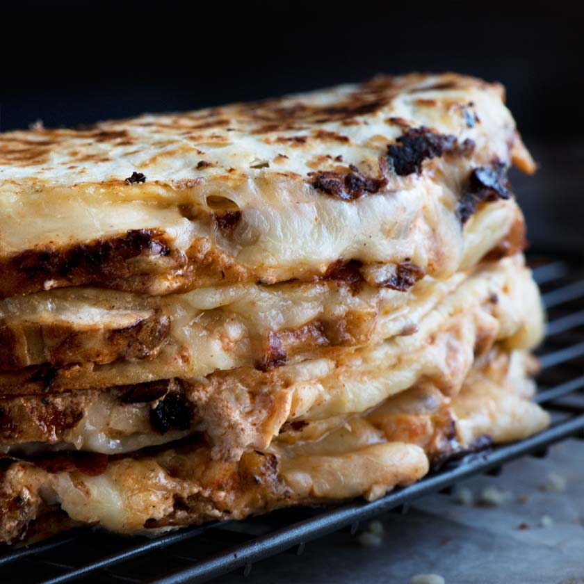 Chicken in Cajun spices seared to moist & tender perfection, a spicy & tangy sauce & ooeey gooey melting cheese. All in a warm tortilla.