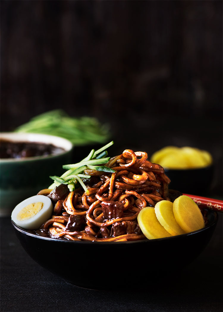 Korean Black Bean Noodles - A savory black bean sauce loaded with seared pork belly & vegetables over soft, chewy noodles. Absolutely hearty, healthy & satisfying.