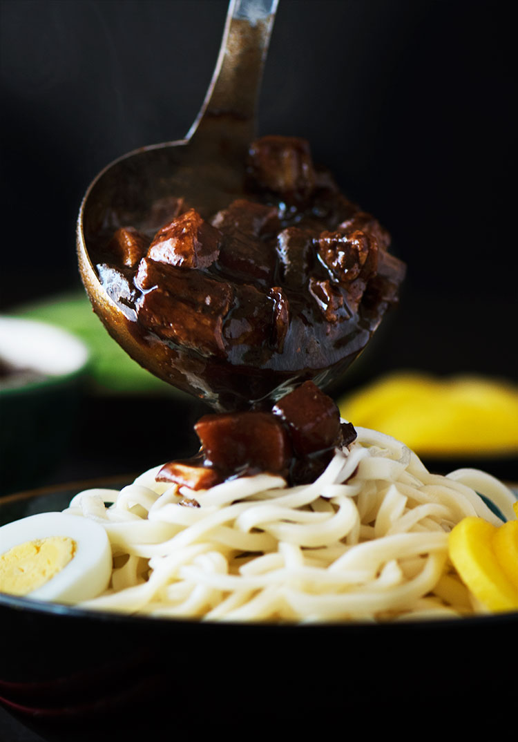 Korean Black Bean Noodles - A savory black bean sauce loaded with seared pork belly & vegetables over soft, chewy noodles. Absolutely hearty, healthy & satisfying.