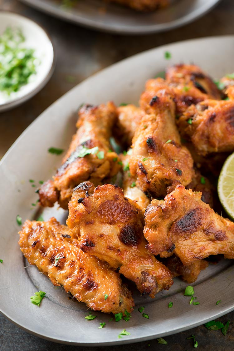 Spicy Lemongrass Wings - Perfectly spicy, savory, sweet & filled with Southeast Asian flavors. Marinated in a flavor packed paste marinade, they are so addictive.