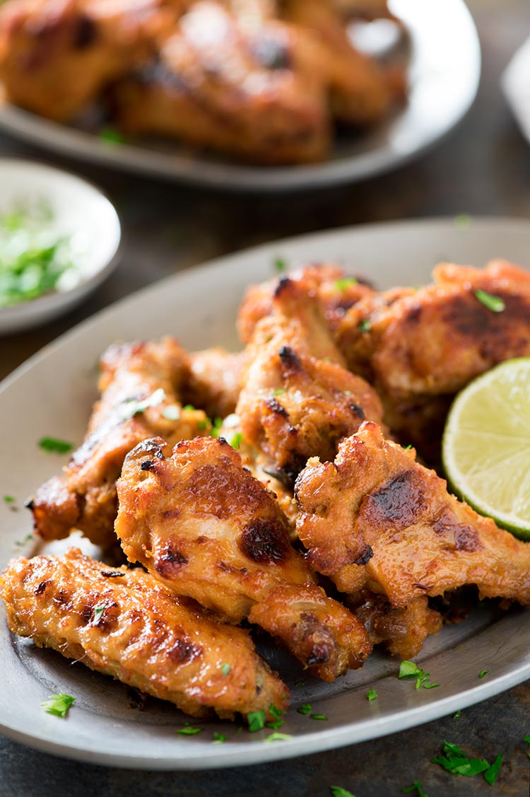 Spicy Lemongrass Wings - Perfectly spicy, savory, sweet & filled with Southeast Asian flavors. Marinated in a flavor packed paste marinade, they are so addictive.