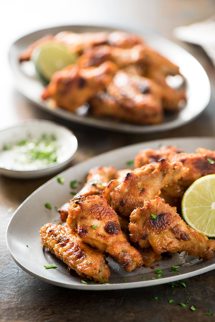 Spicy Lemongrass Wings - Perfectly spicy, savory, sweet & filled with Southeast Asian flavors. Marinated in a flavor packed paste marinade, they are so addictive.