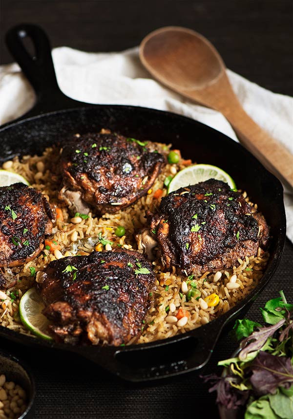 Tender & juicy chicken with spicy & slightly sweet flavor on an herbed Mediterranean rice cooked in chicken broth. So good. So addictive.