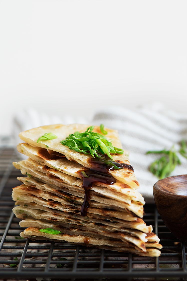 Extra crispy & flaky, lightly chewy Taiwanese Scallion Pancake. Savory pancakes fried to perfection with just 5 ingredients to make at home.