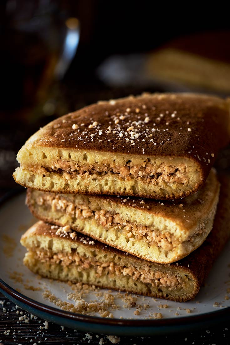 Apam Balik is a soft & fluffy sweet Malaysian peanut turnover pancake stuffed with a sugary, buttery peanut filling.