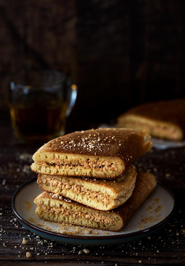 Apam Balik is a soft & fluffy sweet Malaysian peanut turnover pancake stuffed with a sugary, buttery peanut filling.