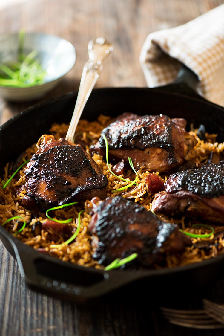 One Pan Malaysian Claypot Chicken Rice - Savory-sweet succulent marinated chicken, flavor boosting Chinese sausages, mushrooms and rice cooked in chicken broth.