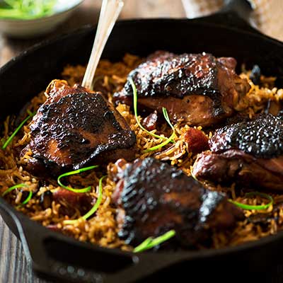One Pan Malaysian (Claypot) Chicken Rice - Savory-sweet succulent marinated chicken, flavor boosting Chinese sausages, mushrooms and rice cooked in chicken broth.