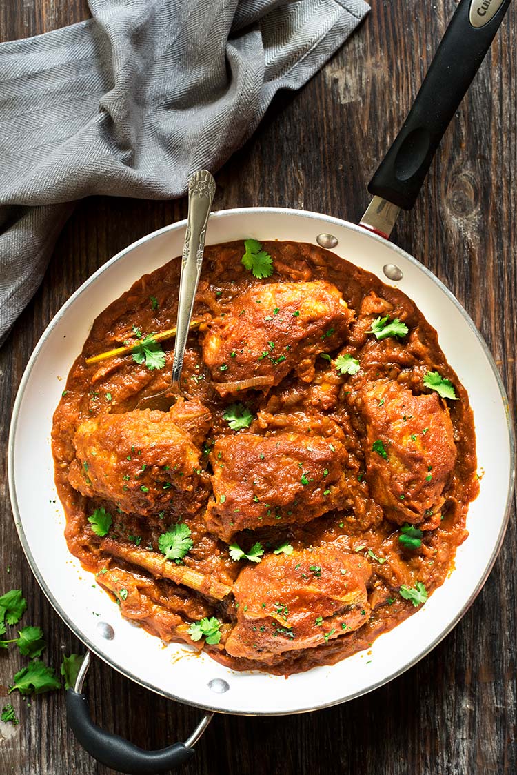 One Pan Chicken in Spicy Tomato Sauce (Ayam Masak Merah) - A classic Malay dish, chicken is seared & braised in a thick spicy, sweet sourish sauce made of a flavorful spice paste & tomato sauce. All in one pan!