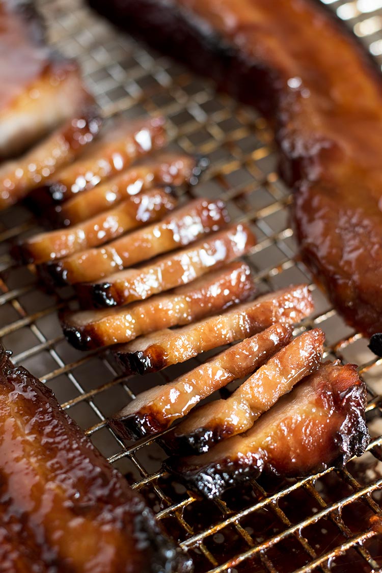 Sticky, tender & moist Chinese BBQ Pork that has been marinated in a sweet & savory concoction. Super simple to make at home and so delicious.