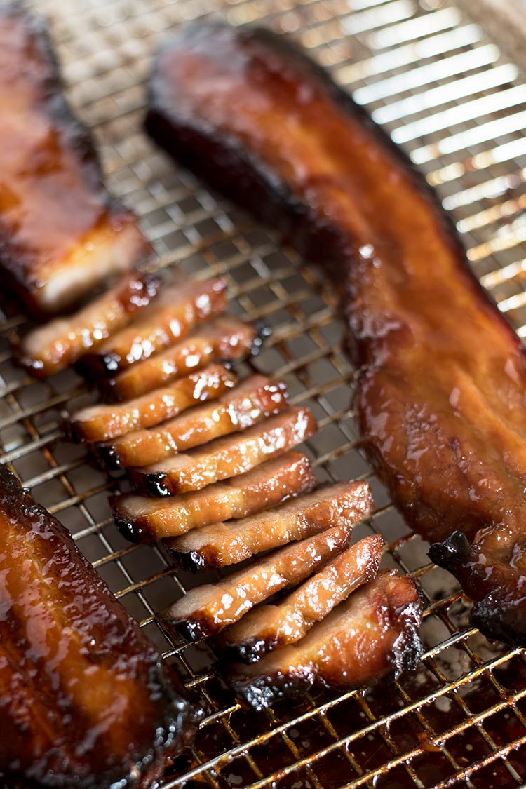 Sticky, tender & moist Chinese BBQ Pork that has been marinated in a sweet & savory concoction. Super simple to make at home and so delicious.