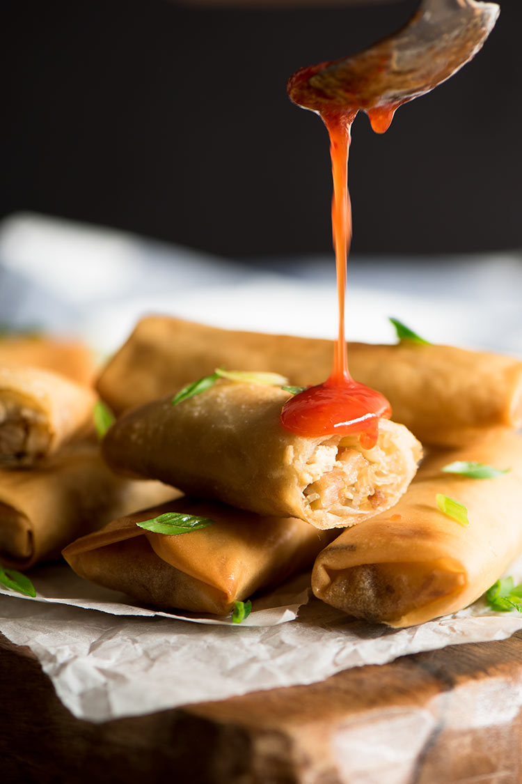 Crispy spring rolls filled with smoky roasted bbq pork belly and vegetables dipped in a sweet & spicy chili sauce.