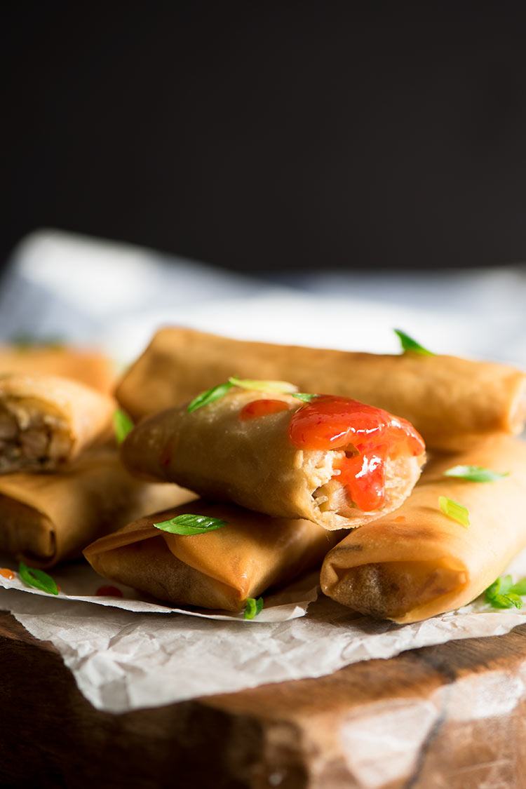 Crispy spring rolls filled with smoky roasted bbq pork belly and vegetables dipped in a sweet & spicy chili sauce.