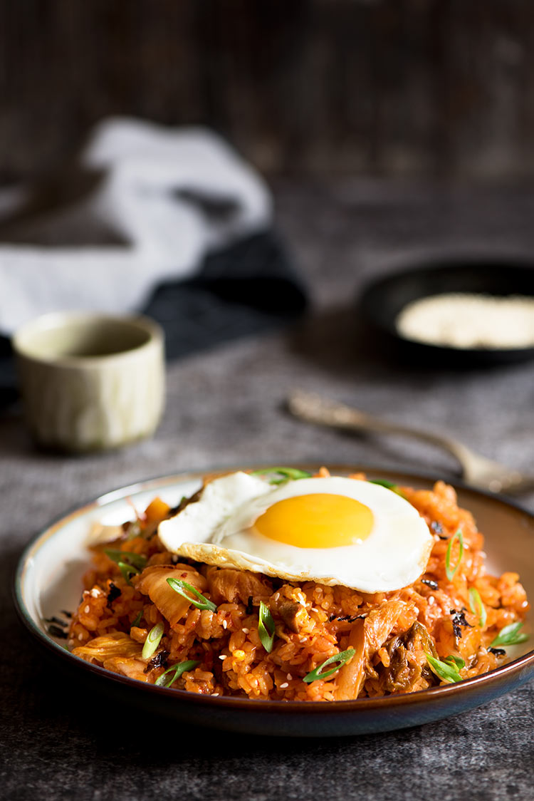 Spicy kimchi pork belly fried rice with sunny side eggs cooked in under 10 minutes.